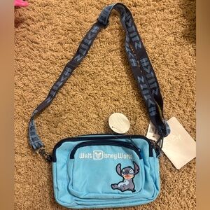 Disney Light Blue Crossbody Bag with stitch and a stitch wallet